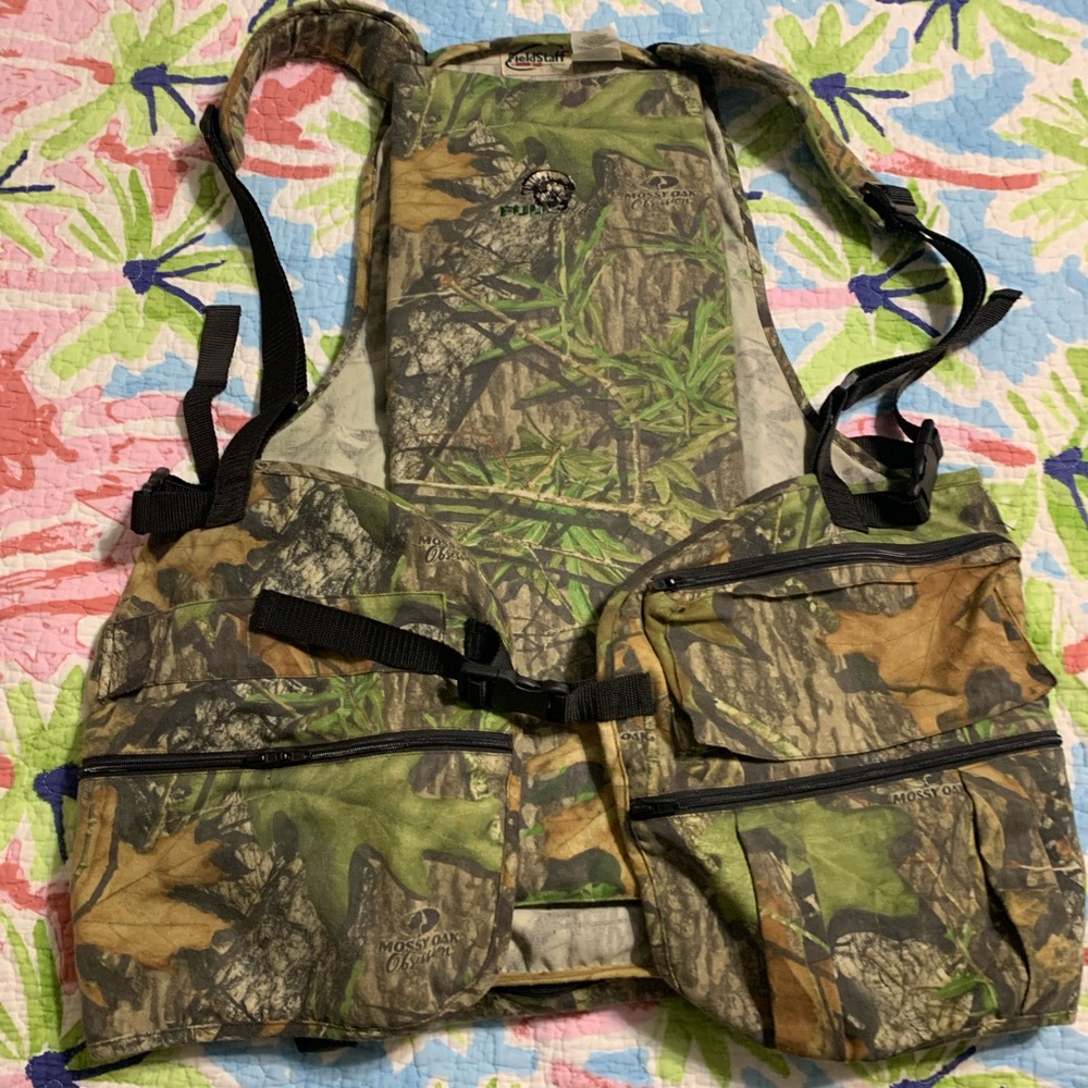 Mossy oak obsession turkey vest. Zip off cushion. Used 3 times.  Been in closet